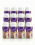 Multiple bottles of PaediaSure shake on a white background