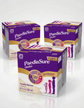 Three boxes of PaediaSure Shake on a white background