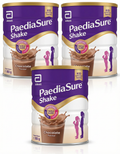 Three cans of PaediaSure Shake with chocolate flavor on a white background